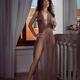 Beautiful sexy woman in sheer unbuttoned dress revealing her naked bod... (thumbnail)