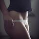 Sensual body parts closeup of a sexy woman undressing taking off her w... (thumbnail)