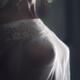 Sensual boudoir closeup of woman sexy breasts under sheer see-through... (thumbnail)