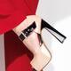 Woman in red pants and high heel platform shoes... (thumbnail)