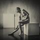 Art nude portrait of woman sitting naked on a posing box in artist stu... (thumbnail)
