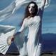 Mysterious ghost-like asian woman in white face mask and flowy dress d... (thumbnail)