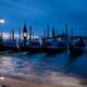 Gondolas in moorings along Venice Grand Canal historic Venice city daw... (thumbnail)