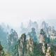 Panorama of Zhangjiajie National Forest Park with mountain spires risi... (thumbnail)