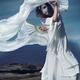 Mysterious asian woman in oriental theatrical face mask and flowy whit... (thumbnail)