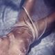 Beautiful nude woman body wrapped with wet sheer cloth in blue water r... (thumbnail)