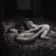 Black and white, beautiful nude sexy couple lying asleep naked cuddled... (thumbnail)