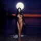 Beautiful mysterious woman in white face mask with sensual nude body w... (thumbnail)