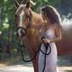 Beautiful sexy woman rider in elegant dress caressing a horse in natur... (thumbnail)