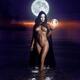 Seductive mysterious snake-like woman in white face mask with sensual... (thumbnail)
