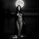 Beautiful mysterious woman in white face mask with sensual nude body w... (thumbnail)