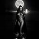 Seductive mysterious woman in white face mask with sensual nude body w... (thumbnail)
