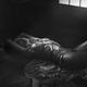 Beautiful nude woman lying on the floor tied up with Shibari bondage r... (thumbnail)