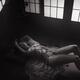 Beautiful nude woman lying on the floor tied up with red Shibari bonda... (thumbnail)