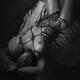 Beautiful nude woman lying on tatami mats tied up with Shibari bondage... (thumbnail)