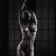 Nude woman standing with Shibari bondage ropes around her sensual nake... (thumbnail)