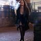 Beautiful woman in sexy provocative black clothes and stockings exhali... (thumbnail)