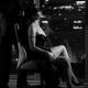 Sensual elegant couple black and white. Man tying blindfold on beautif... (thumbnail)