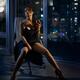 Beautiful seductive woman with glass of wine sitting in chair in provo... (thumbnail)