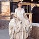Beautiful lady in Venetian carnival costume dress and mask walking alo... (thumbnail)