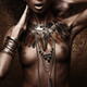 Exotic nude aboriginal woman with tribal feather necklace and jewelry... (thumbnail)