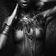 Exotic nude aboriginal woman with tribal feather necklace and jewelry... (thumbnail)