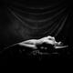 Fine art nude portrait of a beautiful woman lying naked in a sensual g... (thumbnail)