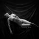 Fine art nude black and white figure portrait of a beautiful woman wit... (thumbnail)