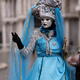 Woman dressed in blue and silver carnival costume and a mask during th... (thumbnail)