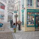 Young woman standing by the wall mural La Fresque des Québécois in O... (thumbnail)