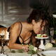 Sexy glamorous woman in lingerie eating a dessert with her sensual mou... (thumbnail)