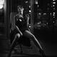 Noir portrait of a gorgeous lady sitting in chair in provocative pose... (thumbnail)