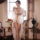 Classy, high-society lady, Venetian courtesan in sheer undone lacy whi... (thumbnail)