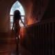 Rear view silhouette of beautiful naked woman walking to a staircase w... (thumbnail)
