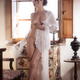 Gorgeous half-naked young woman Venetian courtesan in sheer undone nig... (thumbnail)