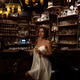 Gorgeous glamorous woman drinking a glass of wine at a bar counter in... (thumbnail)