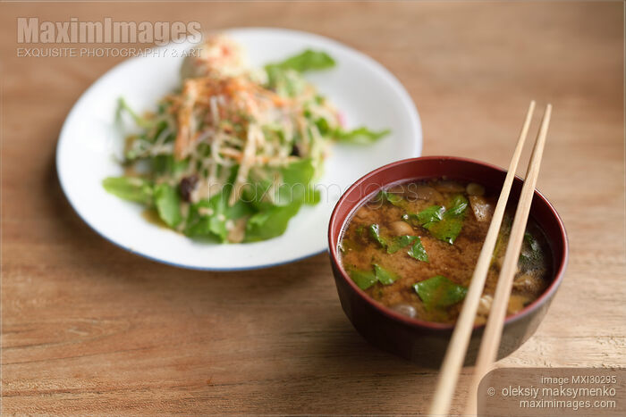 A bowl of spicy Miso soup and vegetable salad in a Japanese restaurant Stock photo of A bowl of spicy Miso soup and vegetable salad in a Japanese restaurant Buy commercial use license at MaximImages