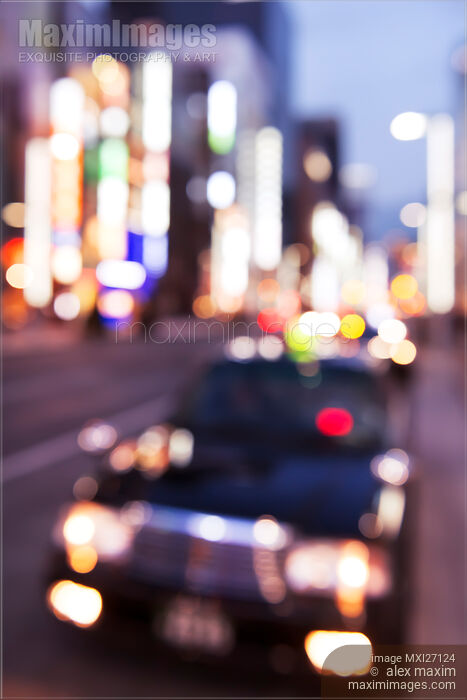 Abstract blurred city scenery of taxi cab in Tokyo Stock photo of Abstract blurred city scenery of taxi cab in Tokyo Buy commercial use license at MaximImages