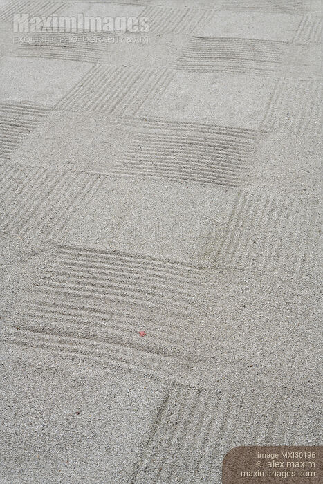 Stock photo of Abstract detail of the design on white gravel of a Japanese Zen garden Buy commercial use license at MaximImages