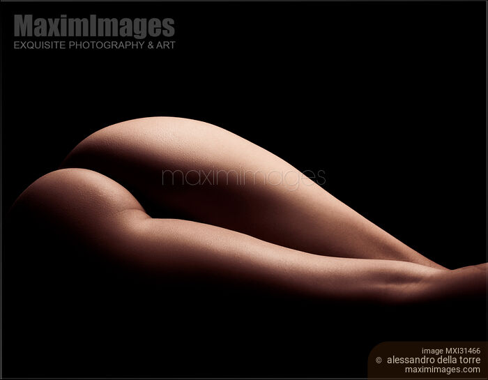 Stock photo of Abstract nude closeup of woman naked buttocks Buy commercial use license at MaximImages