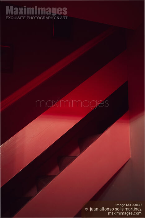 Stock photo of Abstract red lines of a painted metal staircase in London UK Buy commercial use license at MaximImages