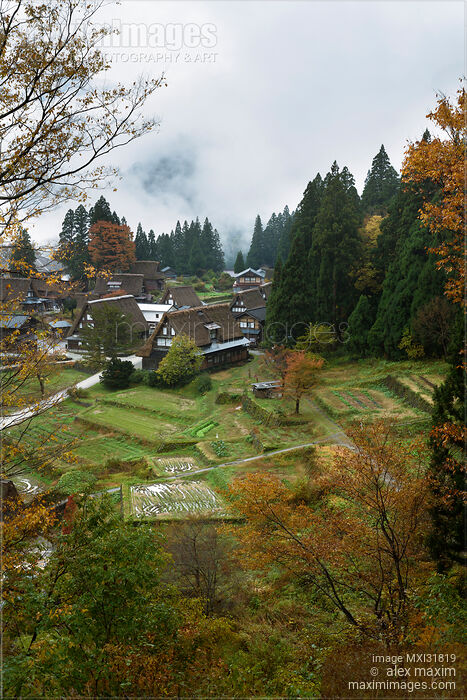 Stock photo of Aerial morning scenery of Ainokura Japanese mountain heritage village in fall Japan Gasshō-style houses Buy commercial use license at MaximImages