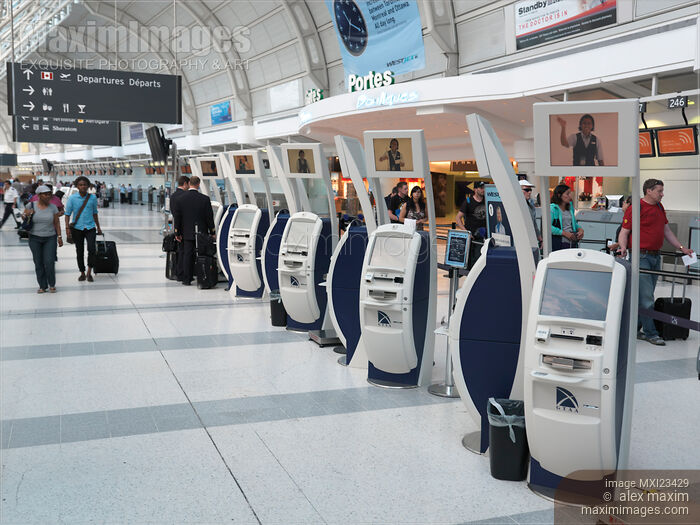 Air Canada Electronic Check-in Kiosks at Airport Stock photo of Air Canada Electronic Check-in Kiosks at Airport Buy commercial use license at MaximImages