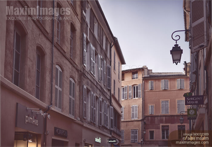 Stock photo of Aix-en-Provence city artistic scenery of buildings and a street lamp under evening sky South of France Buy commercial use license at MaximImages