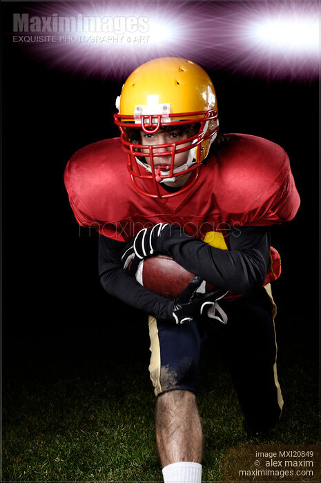 Stock photo of American Football Player Buy commercial use license at MaximImages