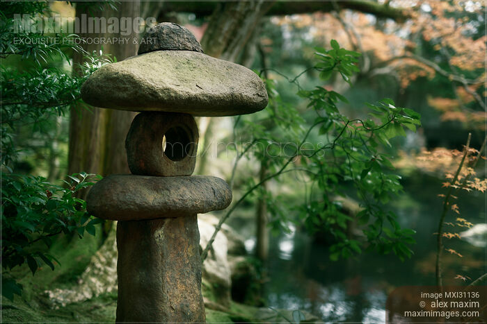 Ancient Ishidoro lantern carved from stone at Tenju-an Japanese Temple garden Stock photo of Ancient Ishidoro lantern carved from stone at Tenju-an Japanese Temple garden Buy commercial use license at MaximImages
