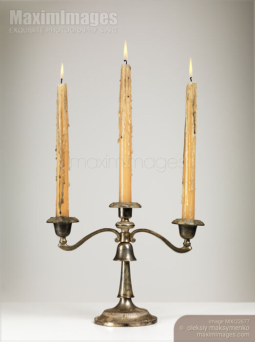 Stock photo of Antique Candle Holder Buy commercial use license at MaximImages