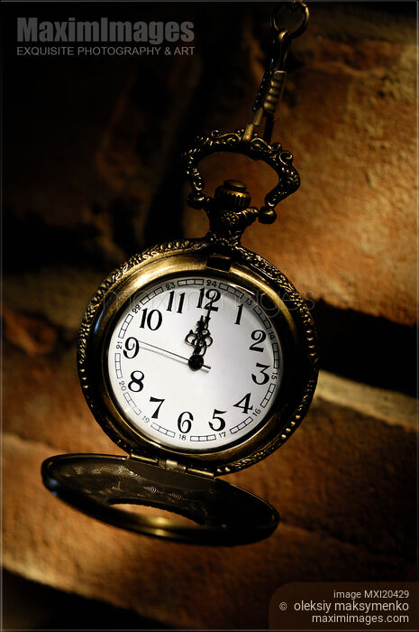 Antique Pocket Watch Showing Twelve Stock photo of Antique Pocket Watch Showing Twelve Buy commercial use license at MaximImages