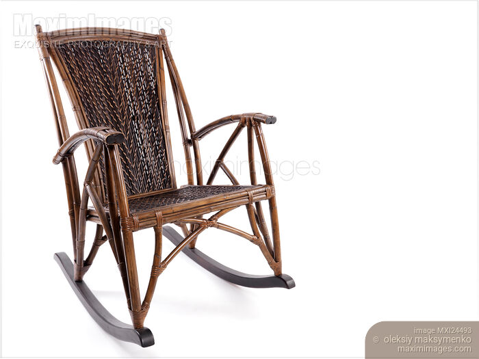 Stock photo of Antique wicker rocking chair isolated on white Buy commercial use license at MaximImages