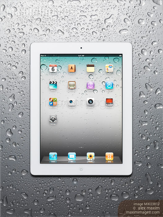 Stock photo of Apple iPad 2 Tablet Computer on Metal Background Buy commercial use license at MaximImages